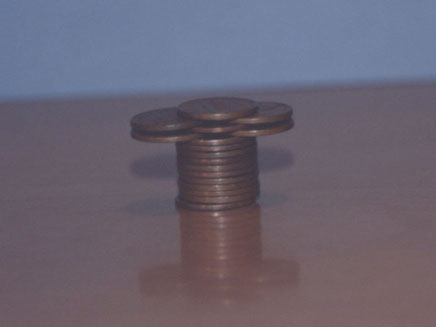 triad of pennies